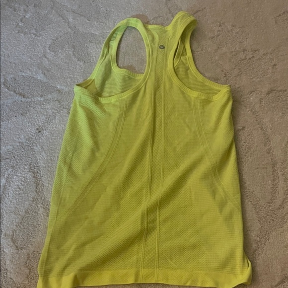 Set of two lulu tanks, one full length (Run Swiftly) and one cropped style. - Picture 3 of 6